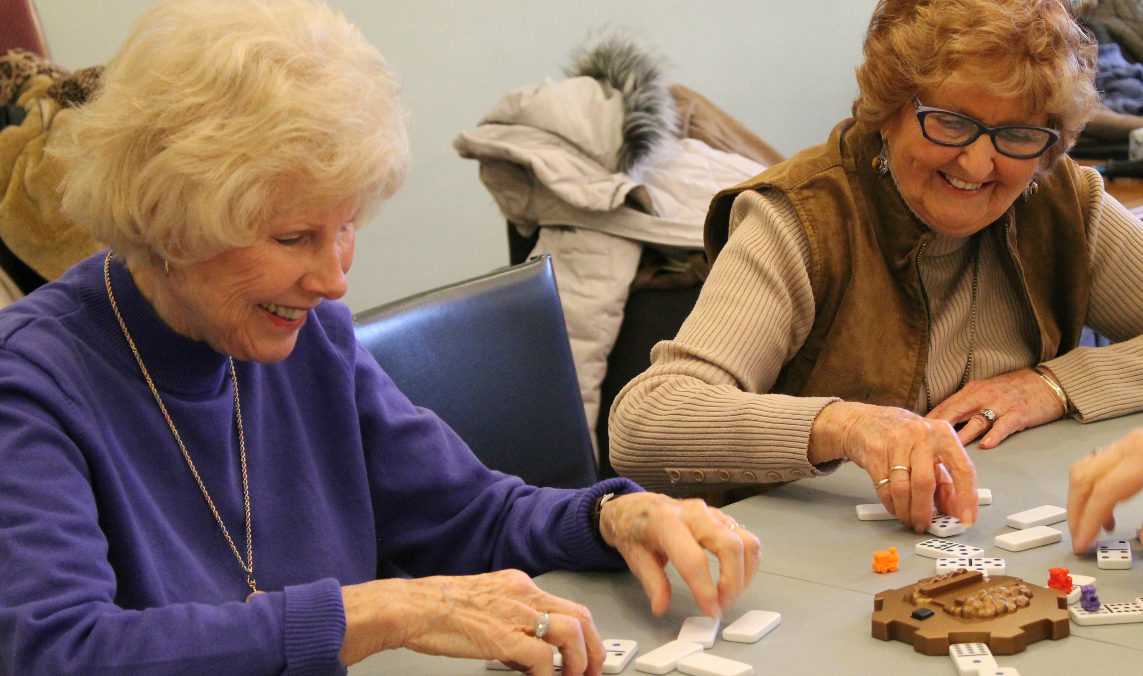 Rachel Weldrick and Stephanie Hatzifililathis (neither shown) spent a day playing — well, losing at — dominoes as they took pictures and talked to these women for the story-telling project, Seniors of Canada.