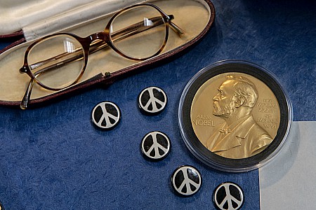 tems from the Russell Archives including his glasses, his Nobel medal, and buttons of the iconic peace sign – the symbol created for the Campaign for Nuclear Disarmament in which Russell was a central figure