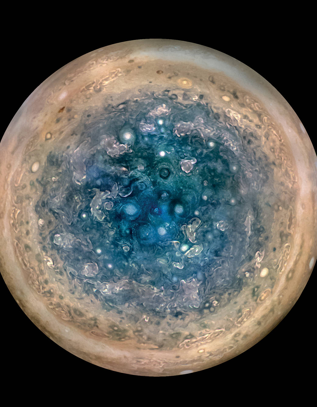 This image, which will be included in the talk, shows Jupiter’s south pole, as seen by NASA’s Juno spacecraft from an altitude of 32,000 miles (52,000 kilometers). The oval features are cyclones, up to 600 miles (1,000 kilometers) in diameter. Multiple images taken with the JunoCam instrument on three separate orbits were combined to show all areas in daylight, enhanced color, and stereographic projection. Image Credit: NASA/JPL-Caltech/SwRI/MSSS/Betsy Asher Hall/Gervasio Robles