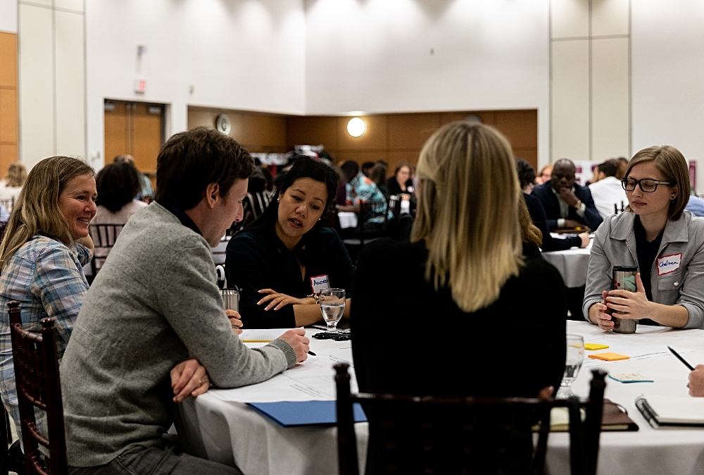 During the Idea Exchange, participants took part in round table discussions led by representatives from Faculties, staff from the Office of Community Engagement, as well as community partners. Image is of a round table discussion.