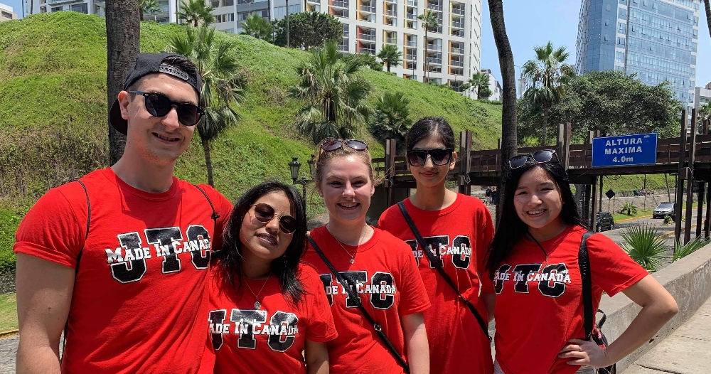 Dhillon and members of her team after winning the Peruvian edition of the Amazing Race.