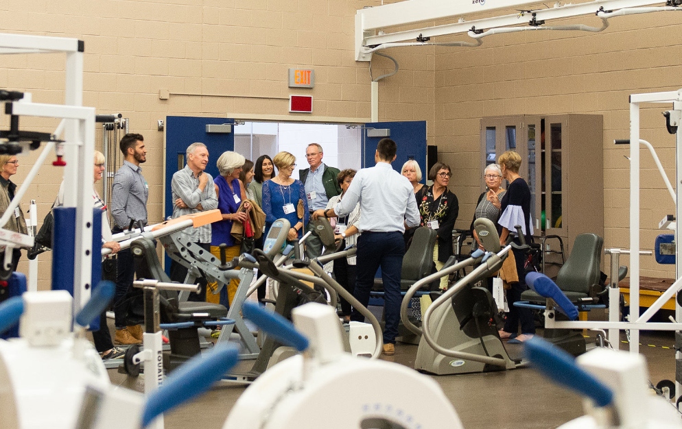 Alumni tour McMaster’s state-of-the-art Physical Activity Centre of Excellence (PACE).