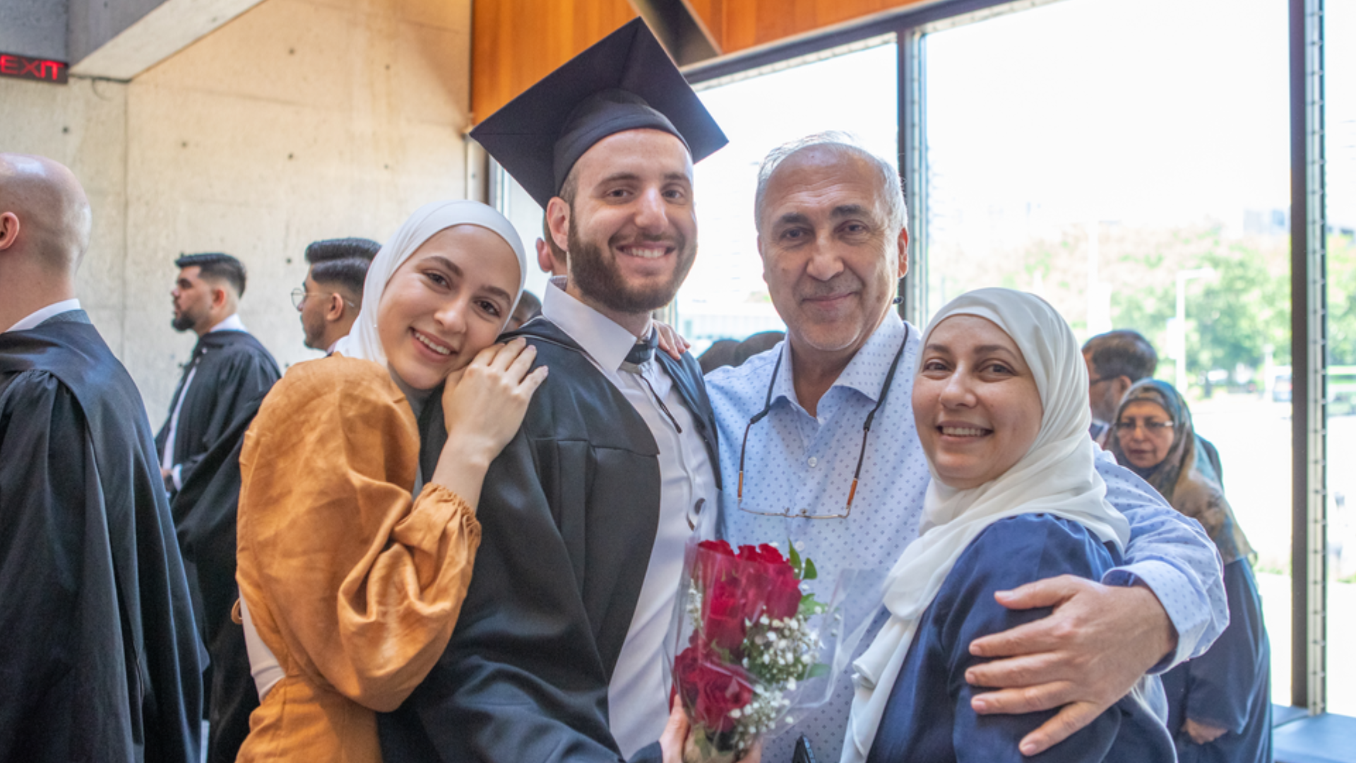 Obaba Albaba poses for a photo with his family