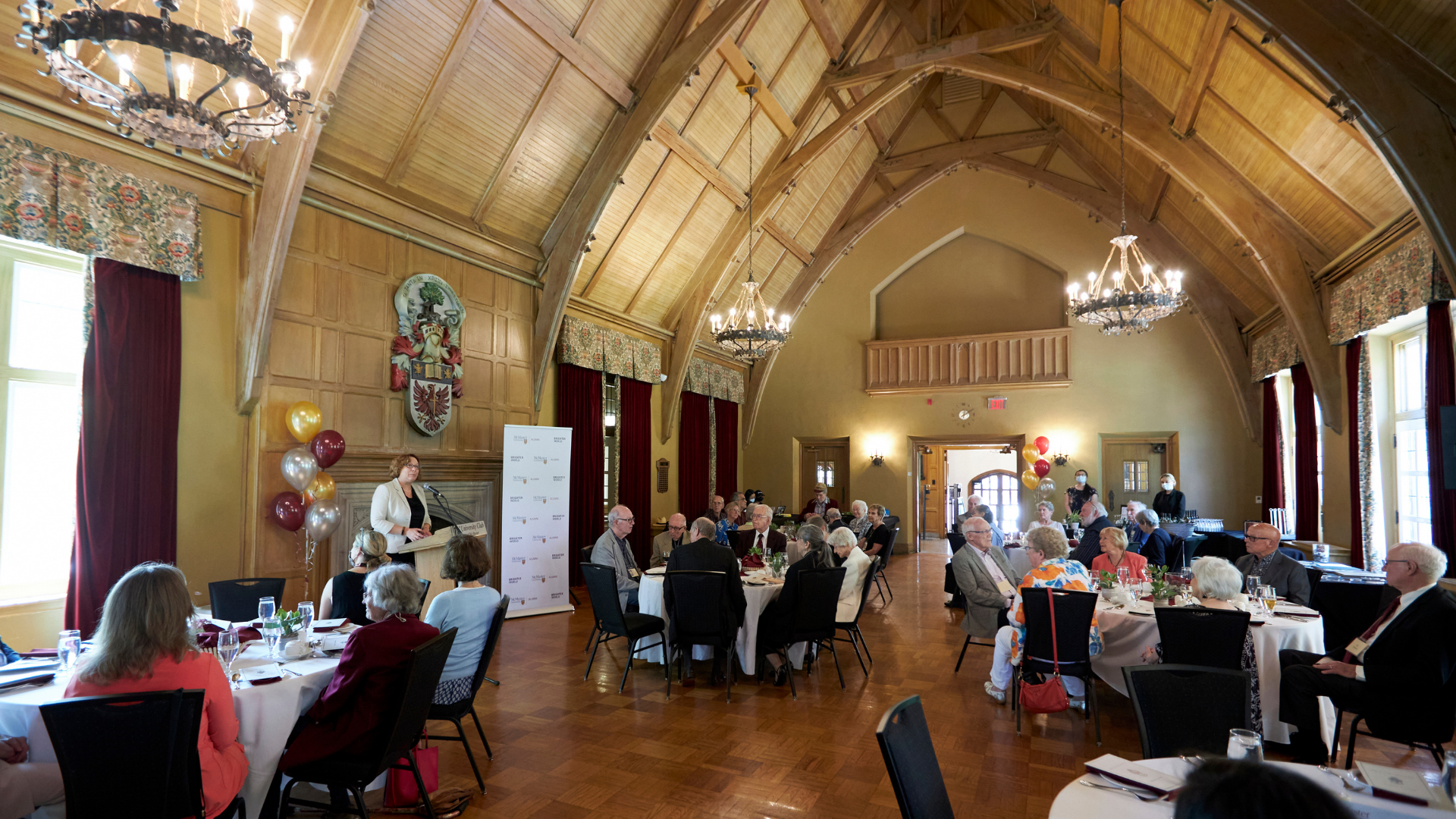 McMaster alumni gathered inside McMaster Alumni Memorial Hall for a luncheon 