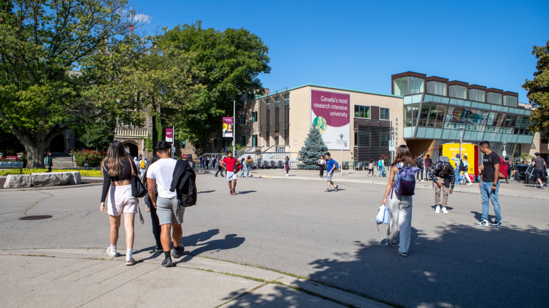 A crowd of students walking on McMaster's campus 