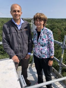 Altaf Arain and Avis Favaro pose for a photo atop the McMaster Centre for Climate Change’s Turkey Point Observatory