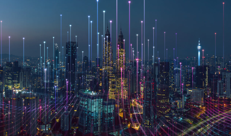 Illustration of a downtown cityscape at night with skyscrapers lit up and lines indicating data points above the skyline.