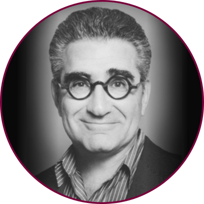 A round black and white headshot of Eugene Levy outlined in maroon 
