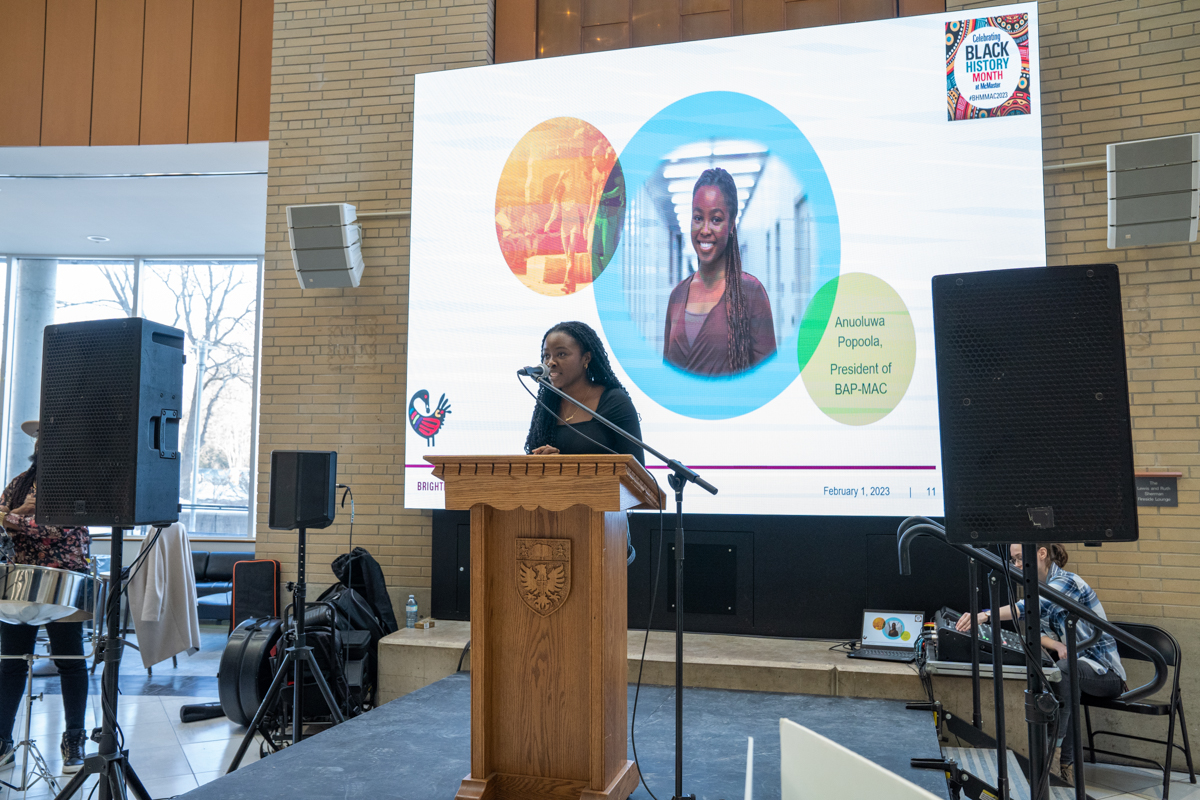 A student delivers a speech to the crowd