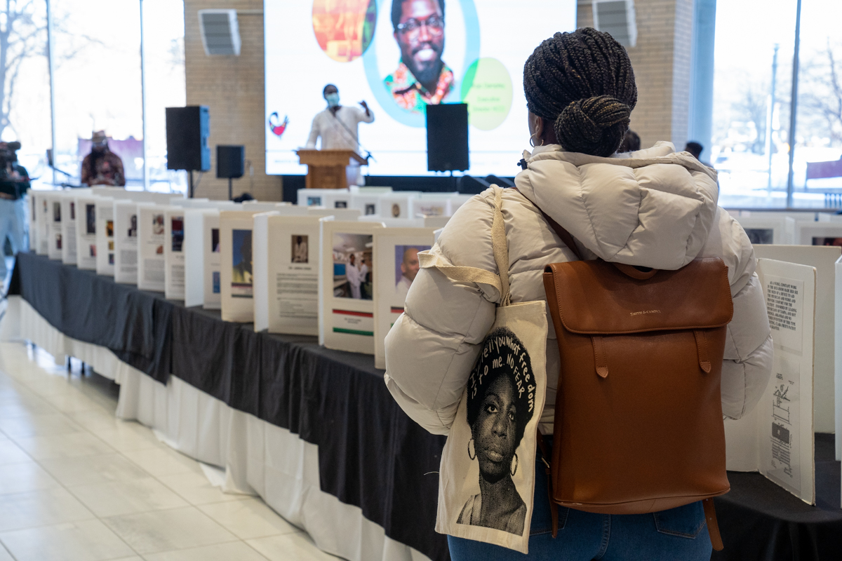 A student listens to a keynote address