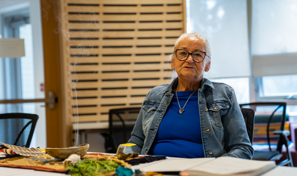 Kathy Knott seated at a table 