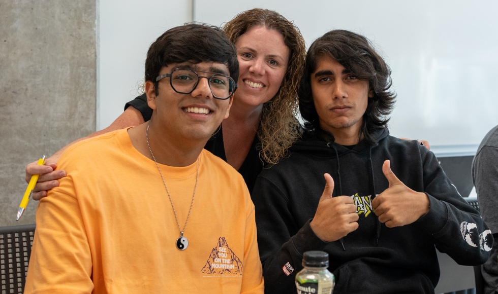 Ana and two students smiling