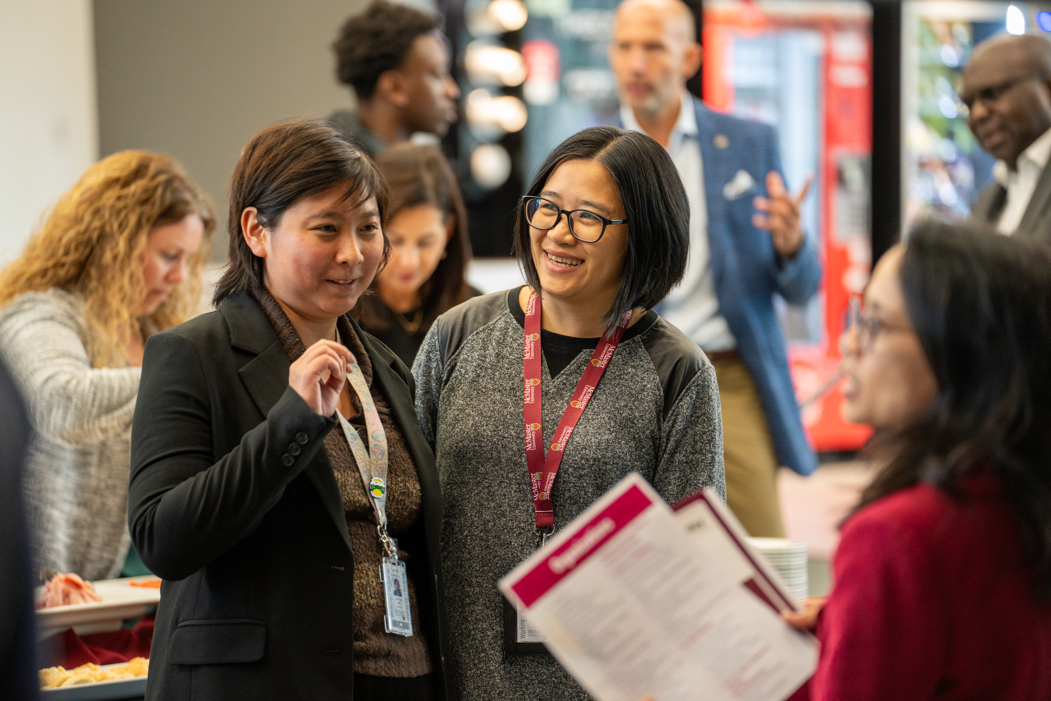 McMaster staff members in conversation