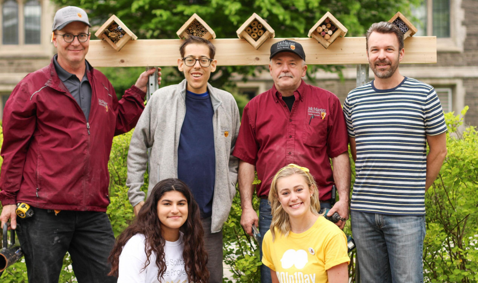 Adam Chiaravalle (top row, second from left) with other members involved in the McMaster Community Bee Project. Photo by: Reta Meng 