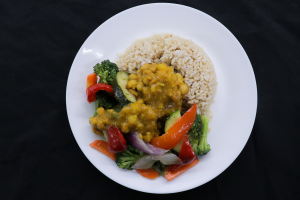 Rice and vegetables on a white plate 