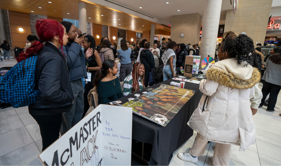 Students browse vendor and student group tables at BHM at Mac launch event 2024