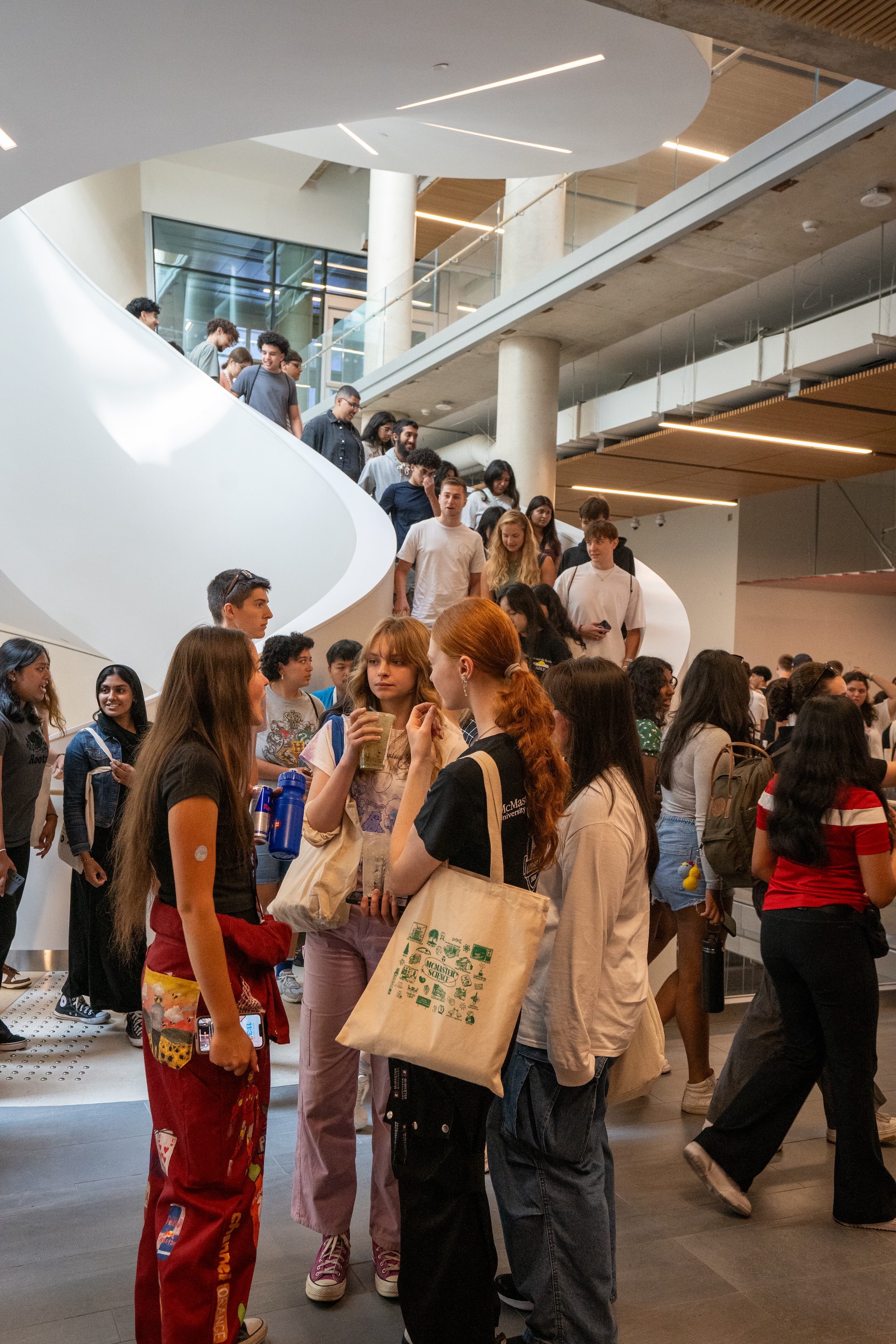 Students fill the stairs and lobby of PGCLL building on campus during welcome week