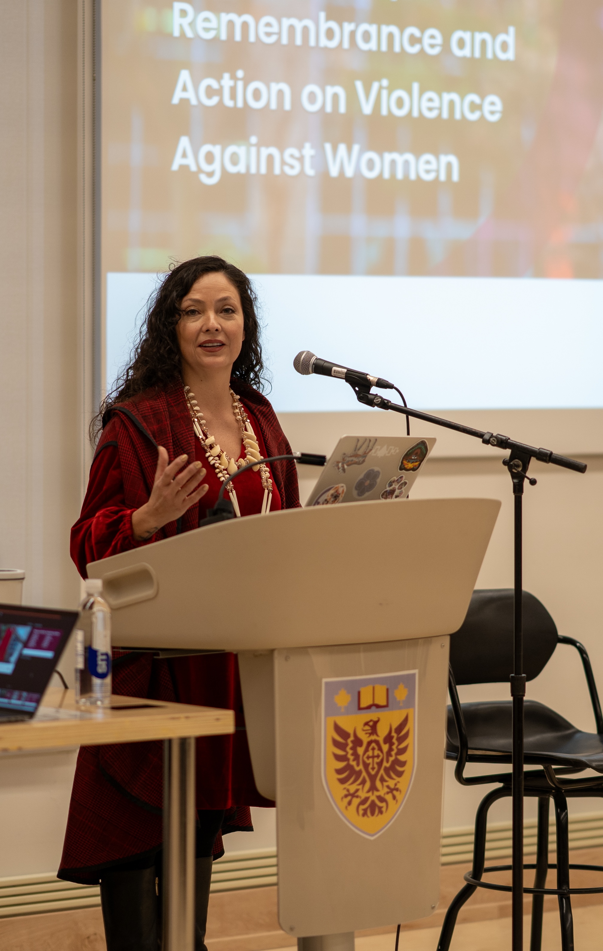 Chancellor Santee Smith speaks at a podium in the classroom