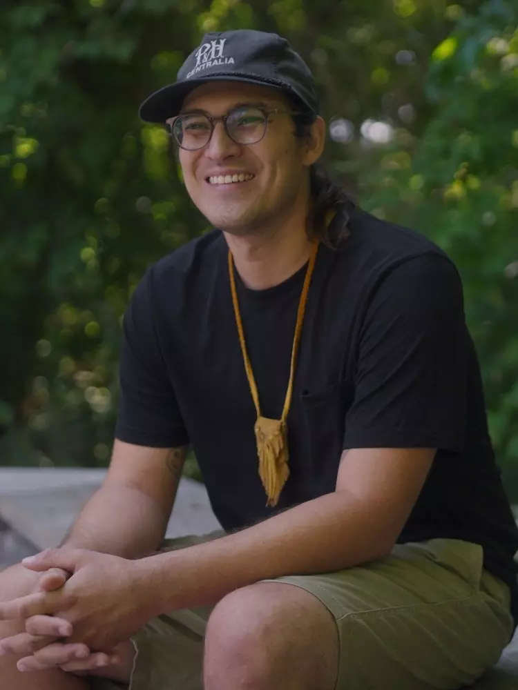 Kyle Joedicke sits outside. 