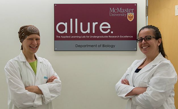 Kim Dej and Rosa da Silva posed in front ot he ALLURE lab in the Department of Biology