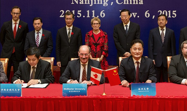 Peter Mascher, McMaster’s AVP International (front row centre) delivered remarks at a summit in Nanjing, China to celebrate and expand research and academic partnerships between Ontario and Jiangsu Province. Ontario Premier Kathleen Wynne (back row centre) co-chaired the meeting.