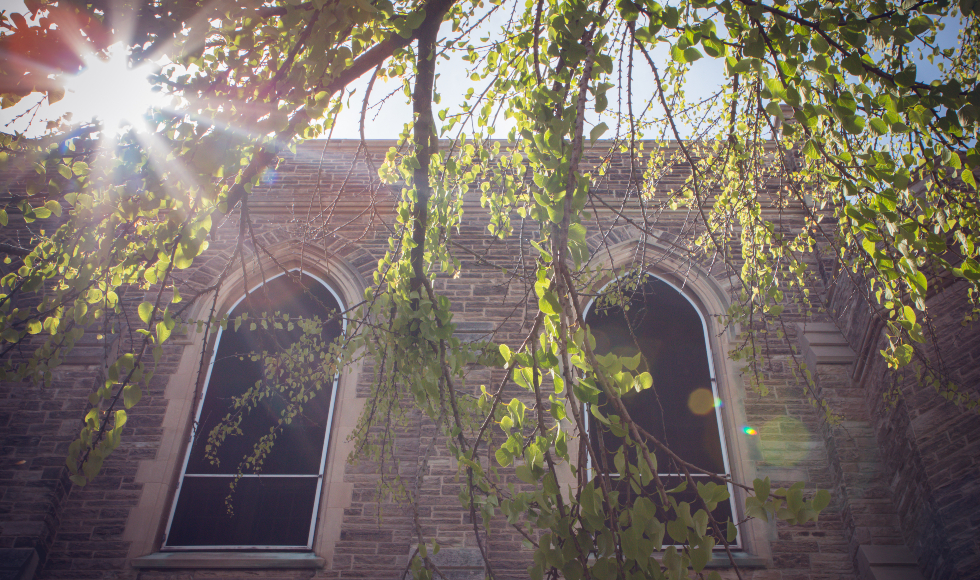 A view of McMaster's University Hall in sunlight