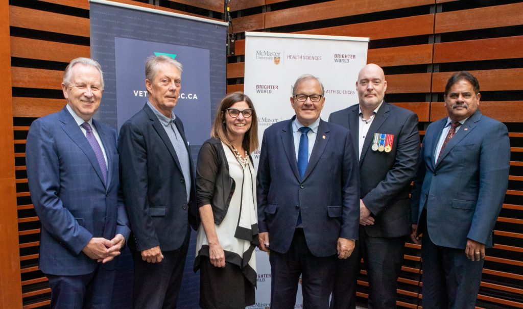 From left: Faculty of Health Sciences Dean Paul O'Byrne, Hamilton Mayor Fred Eisenberger, MP and Minister of Seniors Filomena Tassi, Veterans Affairs Minister Lawrence MacAulay, retired Corporal John Brown and Centre of Excellence on Chronic Pain medical director Ramesh Zacharias