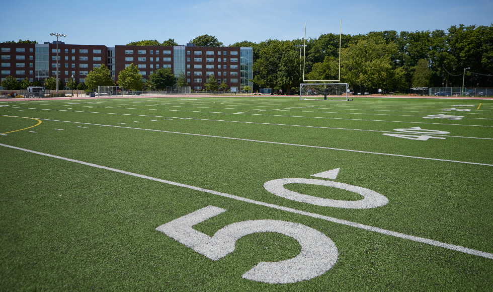 long shot of football field from 50-yard line