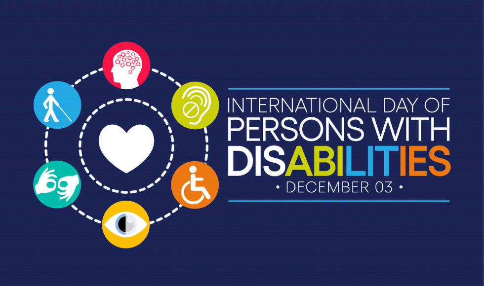 A graphic that reads 'International Day of Persons with Disabilities - December 3.’ The lettering is on a dark blue background. There is a graphic of a white heart surrounded by two white circles. The outer circle has graphics of a brain, an ear, a wheelchair, an eye, two hands engaged in sign language and a silhouette of a person with a cane.