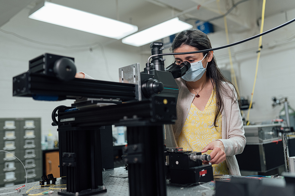 Engineering PhD student works in an Engineering lab.