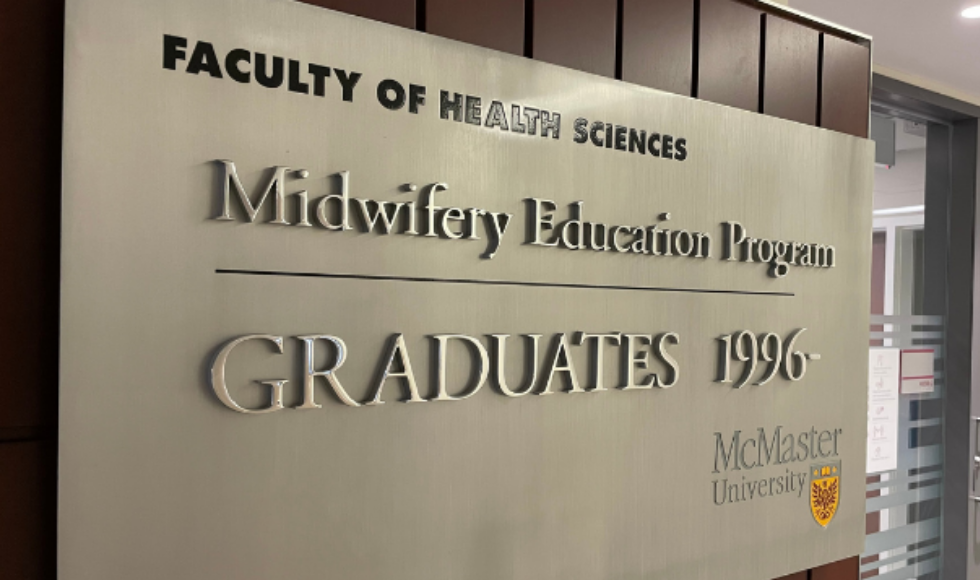 A sign that says Faculty of Health Sciences, Midwifery Education Program.
