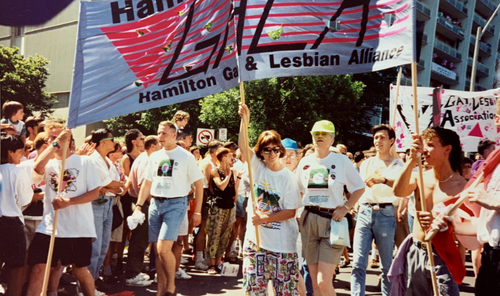 Members of the Hamilton Gay and Lesbian Alliance (GALA) marching in a Pride Parade in 1992.