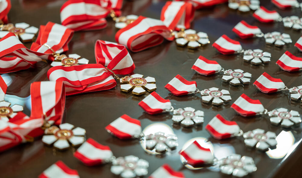 Order of Canada insignias laid out on a table