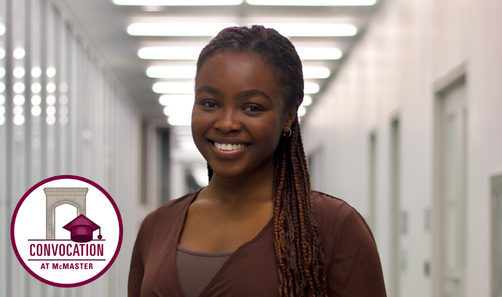 Anu Popoola smiling at the camera