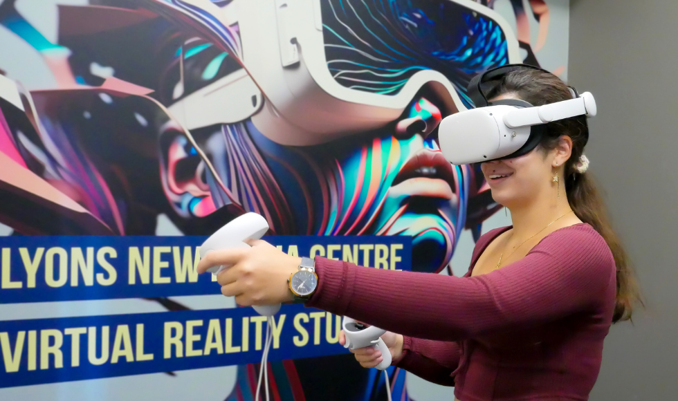 A student wearing a virtual reality headset