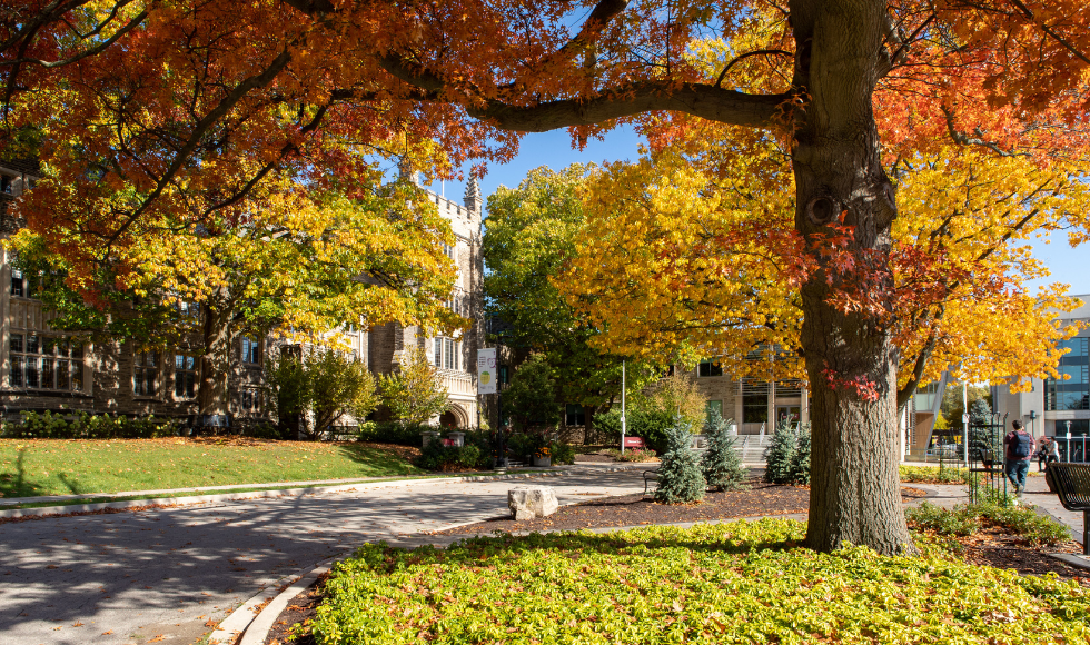 McMaster's University Hall with trees in front