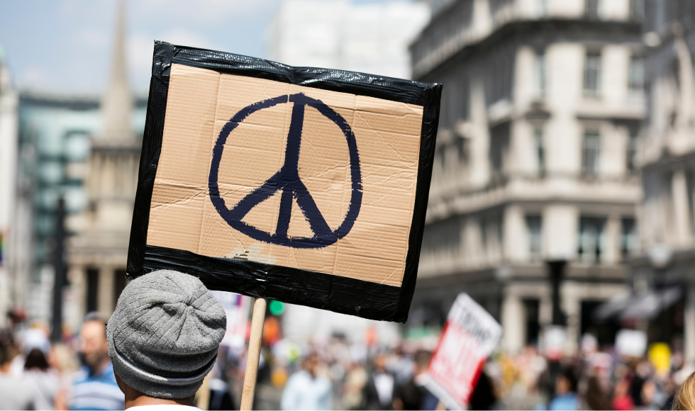 a peace sign at a demonstration