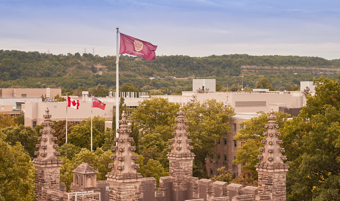 McMaster's flag flying at the top of University Hall, seen from a spot that's just as high off the ground.