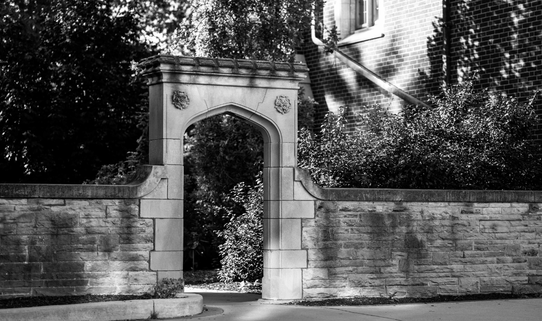 Black and white image: Edwards Arch on McMaster's campus in the summer