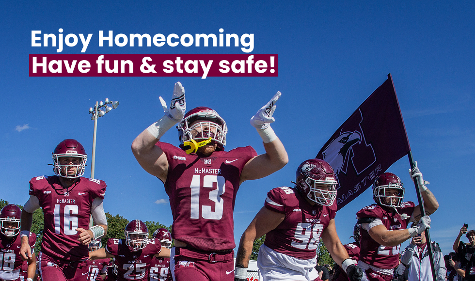 McMaster Marauders men's football players running on to the field on a blue-sky day, with text that reads: Enjoy Homecoming. Have fun and stay safe!