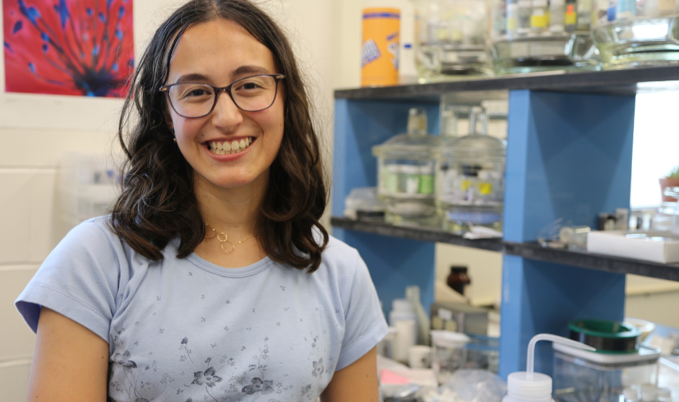 A headshot of a woman in a lab.